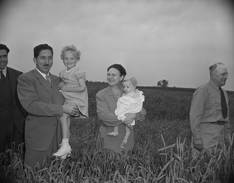 President of Mexico viewing test field with family in 1947