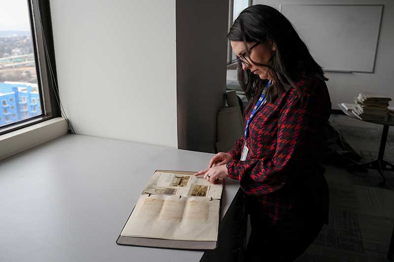 Person looking through book
