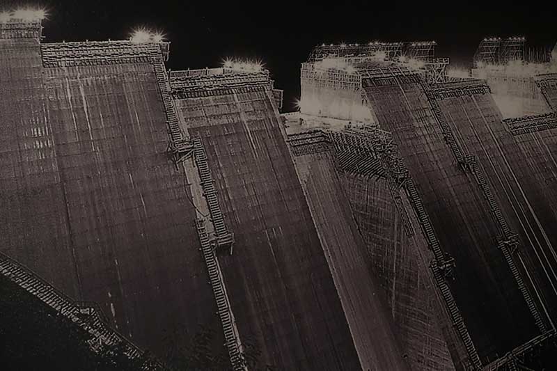 dark exposure of Norris Dam under construction