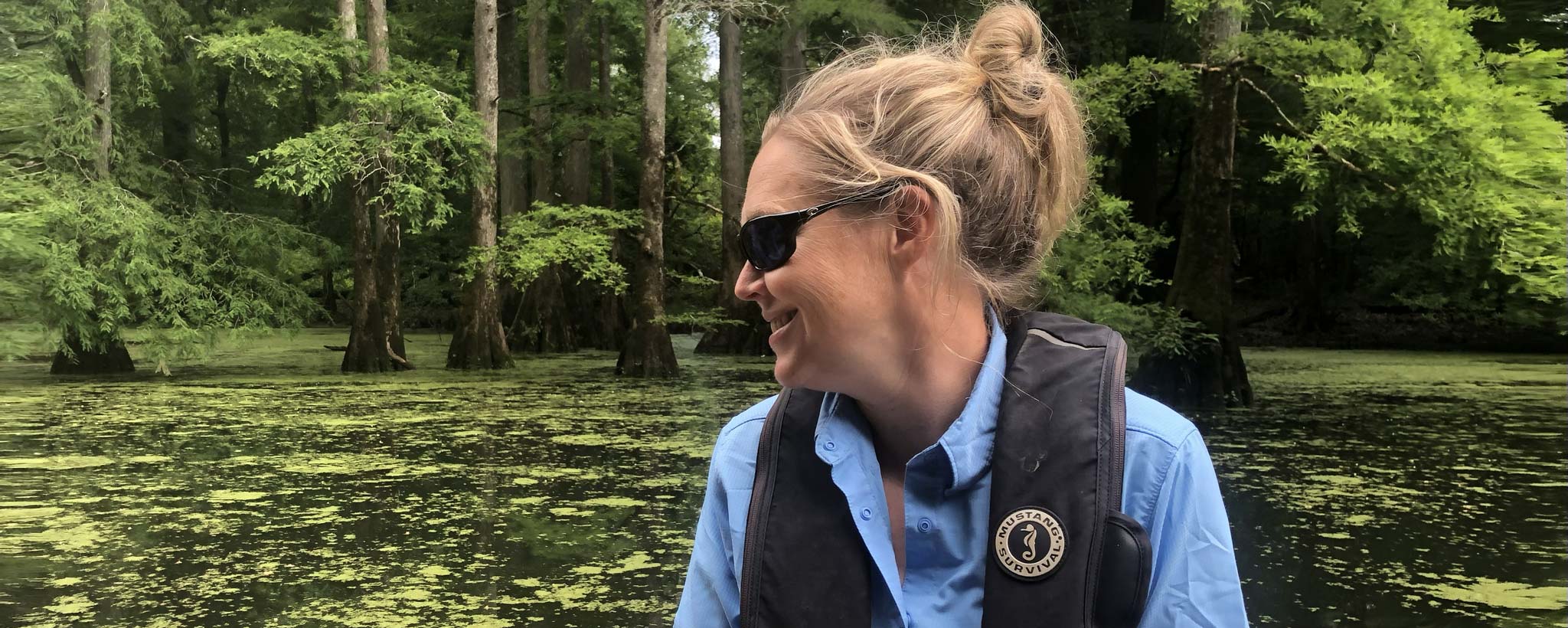 Archaeologist-Erin TVA Senior Archeology Specialist Erin Dunsmore travels by boat to check on sealed caves.
