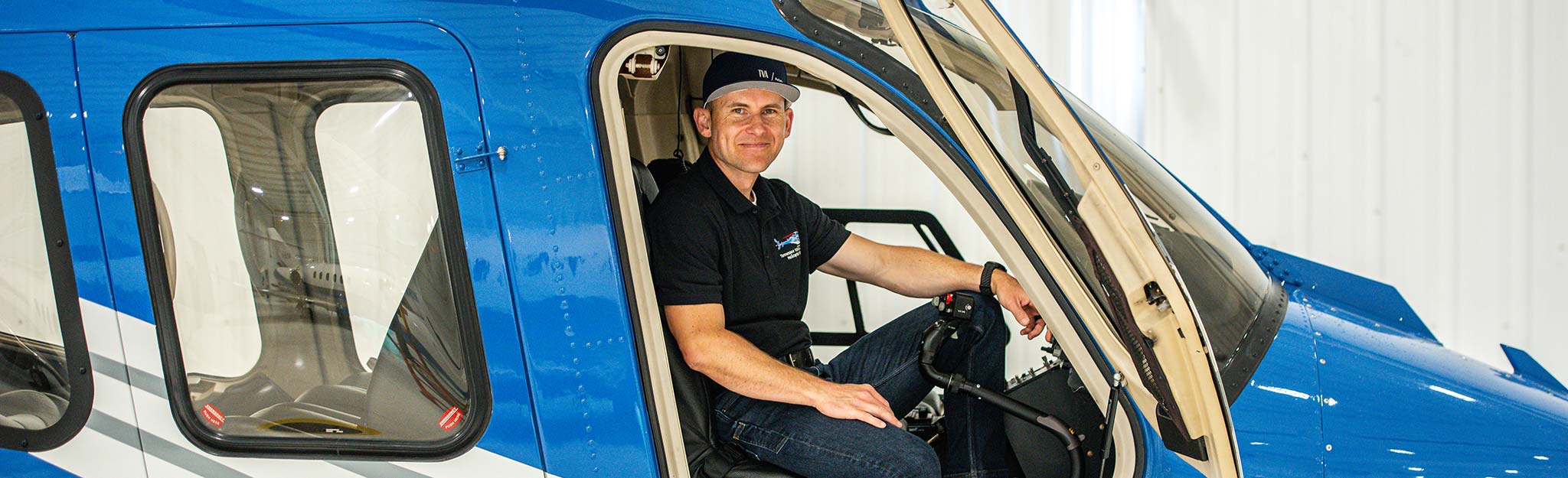 TVA pilot Peter Kretowski pilots a TVA helicopter