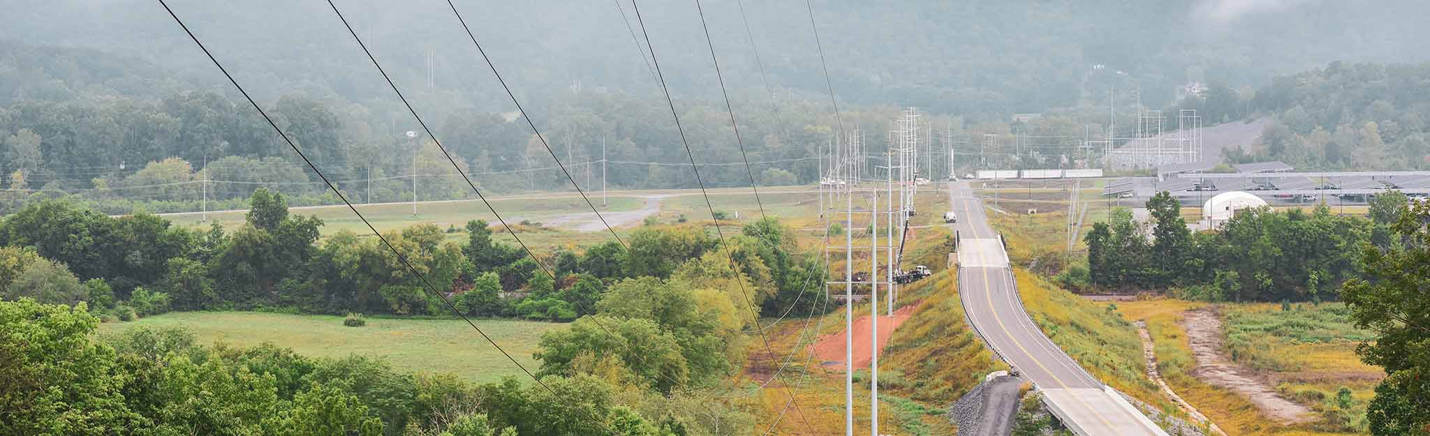 Electric transmission lines stretching into the distance