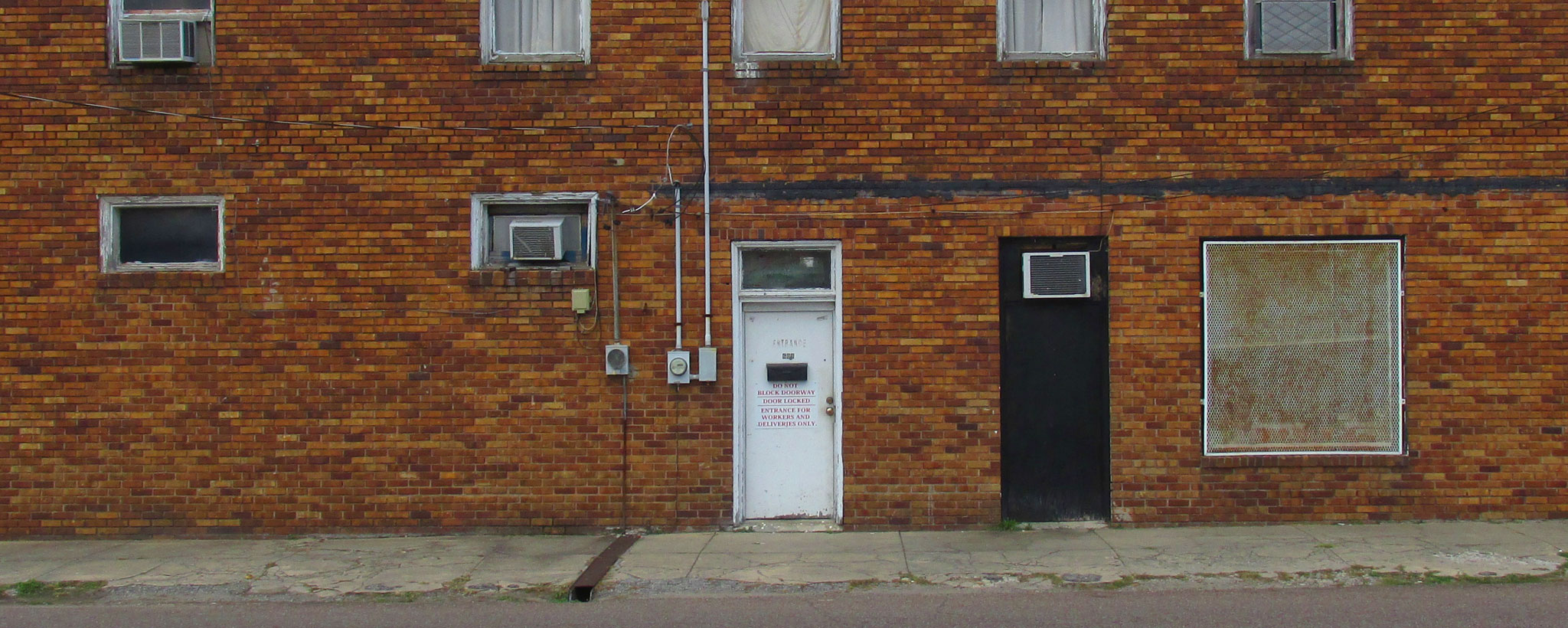 Doors on a Brick Wall Doors on a Brick Wall
