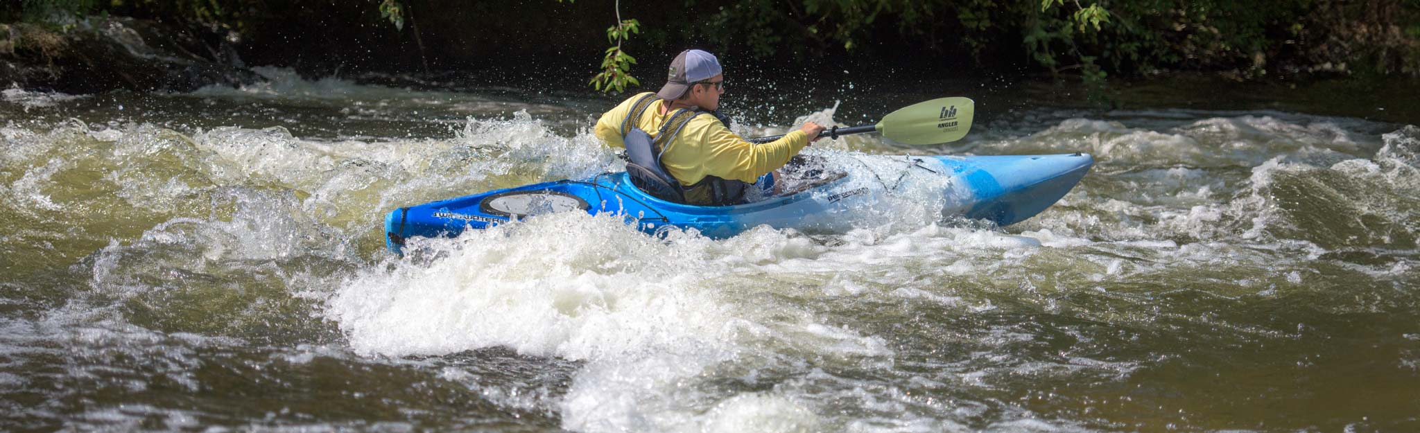Kayaker in rapids