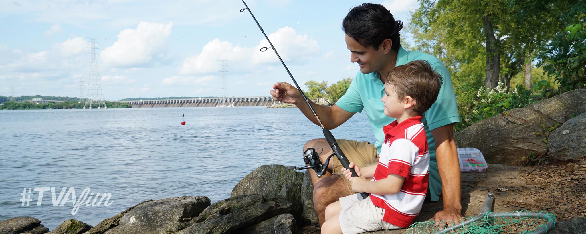 Dad and son fishing in a lake Dad and son fishing in a lake