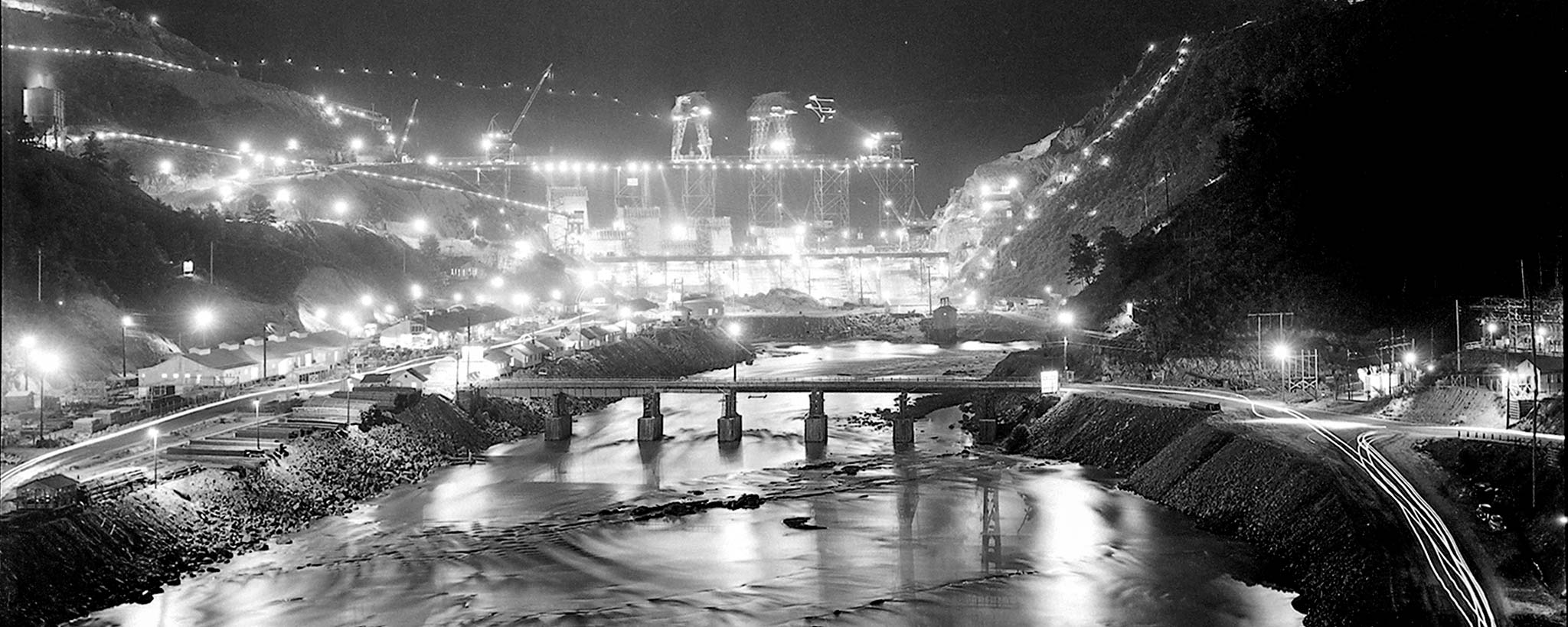 dam construction at night