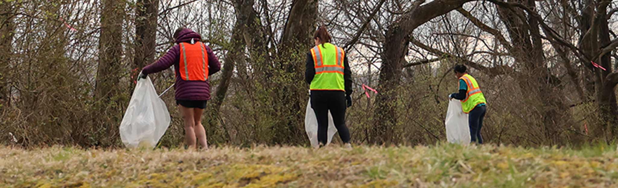 Volunteers pick up trash from trail and recreation areas