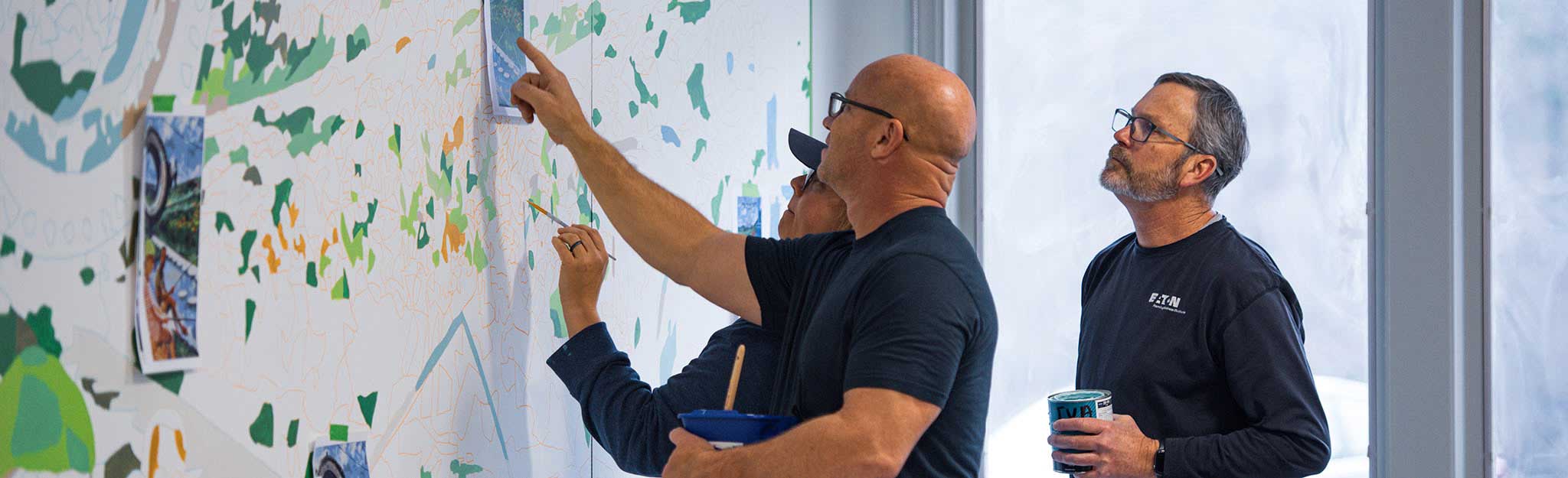 TVA employees work on mural at Raccoon Mountain Pumped Storage facility near Chattanooga.
