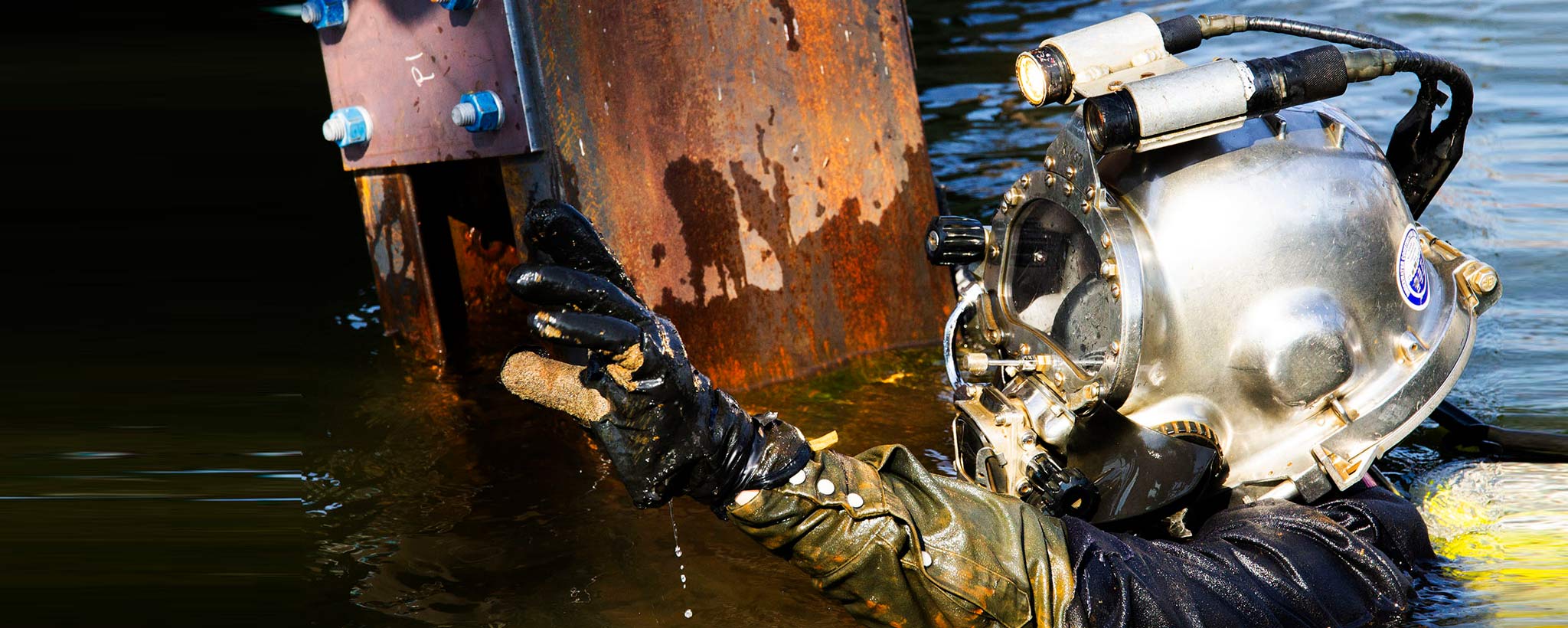 scuba-diver-2040-by-820 Suba diver screwing on bolts
