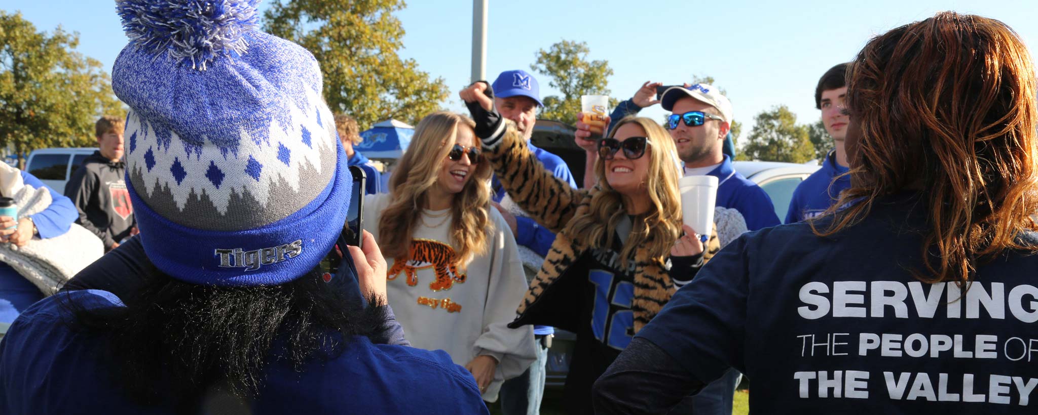 People celebrates tailgate party