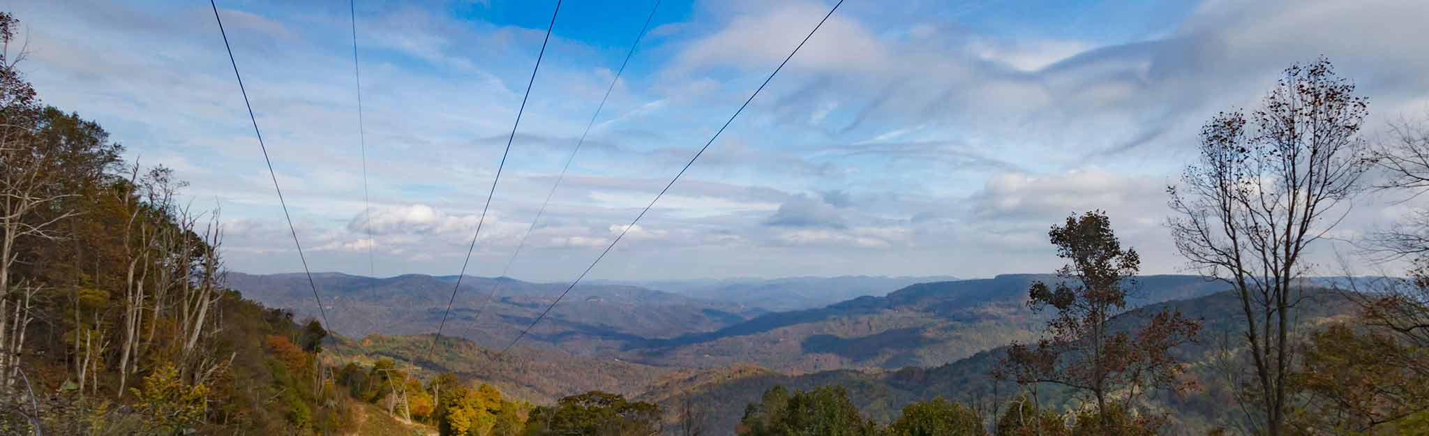 Power lines stretching out toward mountains