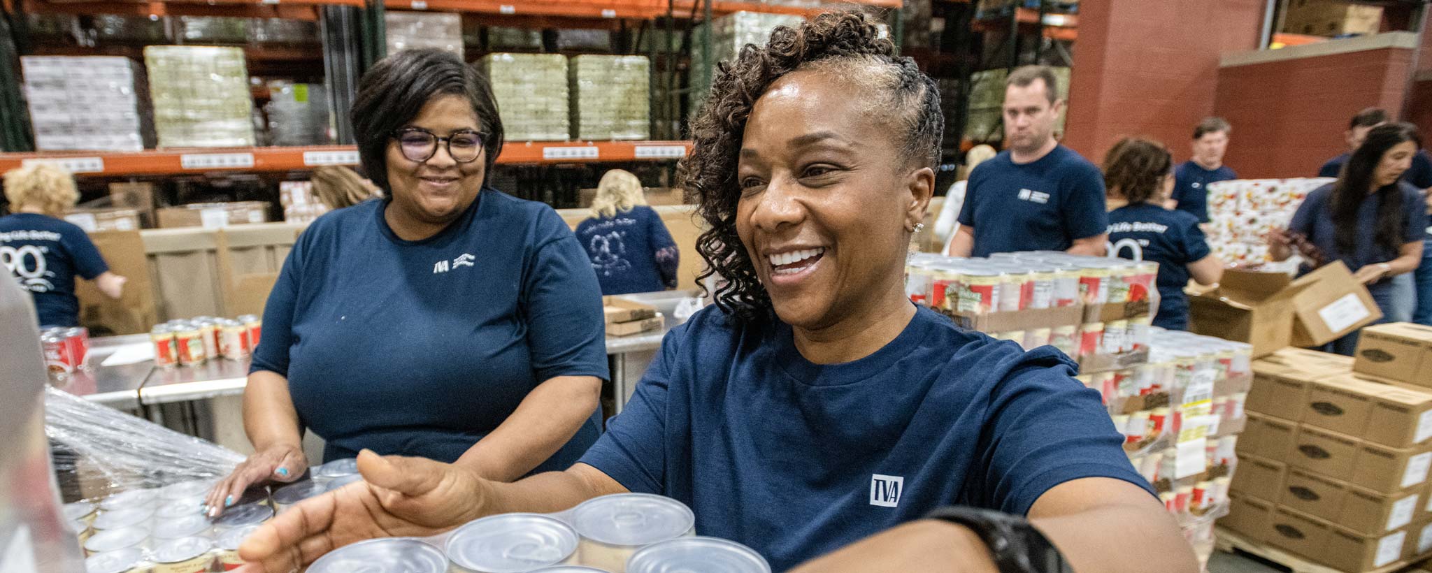 TVA volunteers in Harvest Food Warehouse Bank