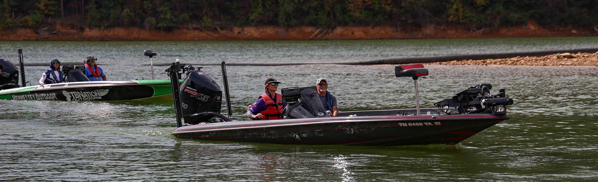 Boats returning to shore at Watauga Reservoir