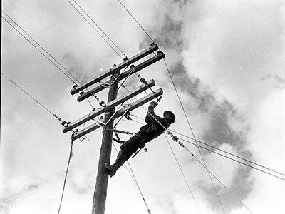 A lineworker in Alabama in 1934 helped to extend electric service to rural areas
