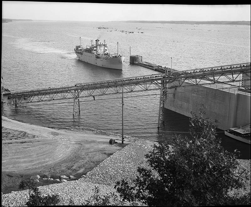 A ship enters the lock at Kentucky Dam in September 1944. With the completion of Kentucky Dam that year, TVA made the Tennessee River navigable all the way from Knoxville, Tennessee, to Paducah, Kentucky.