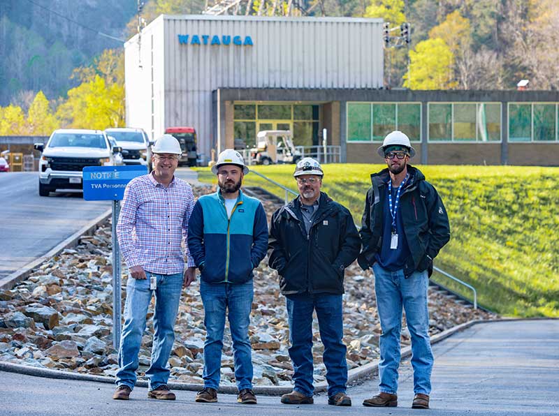 At Watauga Dam, from left: Tommy Bell, Project Manager, TVA Generation Projects; Dustin Wright, Outage Services Manager, TVA Outage Execution; and contract partners Paul Holler and Jordan Clark, both construction managers.