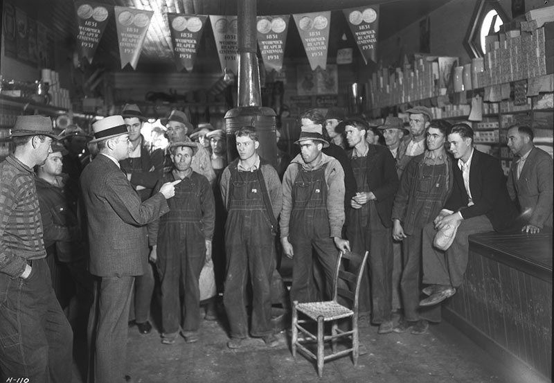 A TVA employee meets with job applicants in Union County, Tennessee, in November 1933. TVA began hiring during the depths of the Great Depression and put nearly 200,000 people to work over its first 20 years.