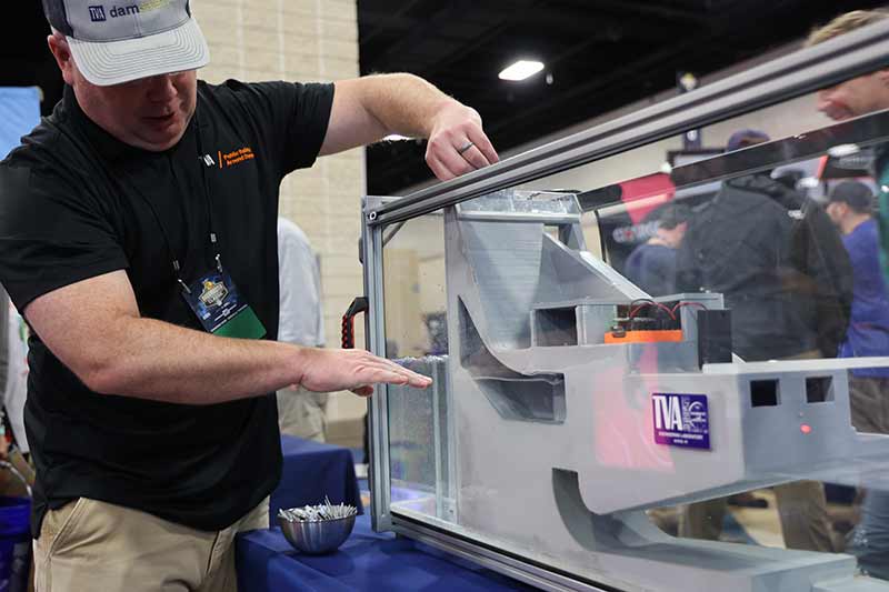 TVA personnel demonstrate how a dam works