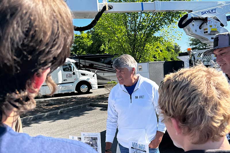 TVA Transmission employees discuss their work with students.