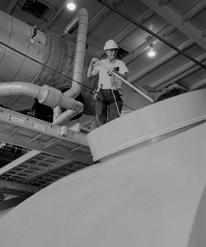 Laborer Leonard McGuire demonstrates safe working practices