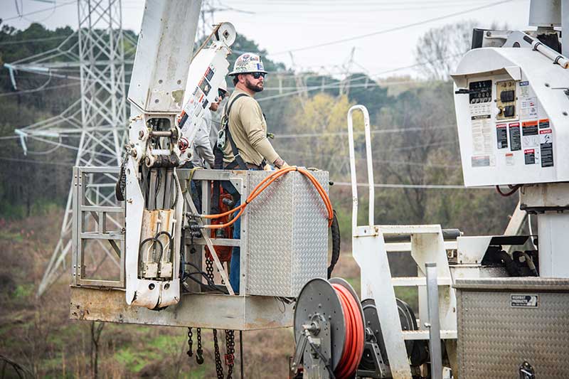 Lineworker in bucket lift