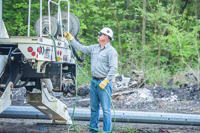 Simmons preps equipment for transmission maintenance work.