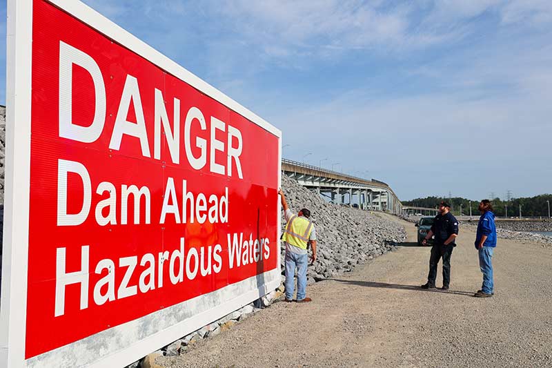 New sign at Pickwick Dam warns of the dam ahead and hazardous waters