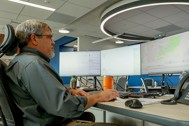 Darrell Guinn at TVA's River Forecast Center, works at a computer