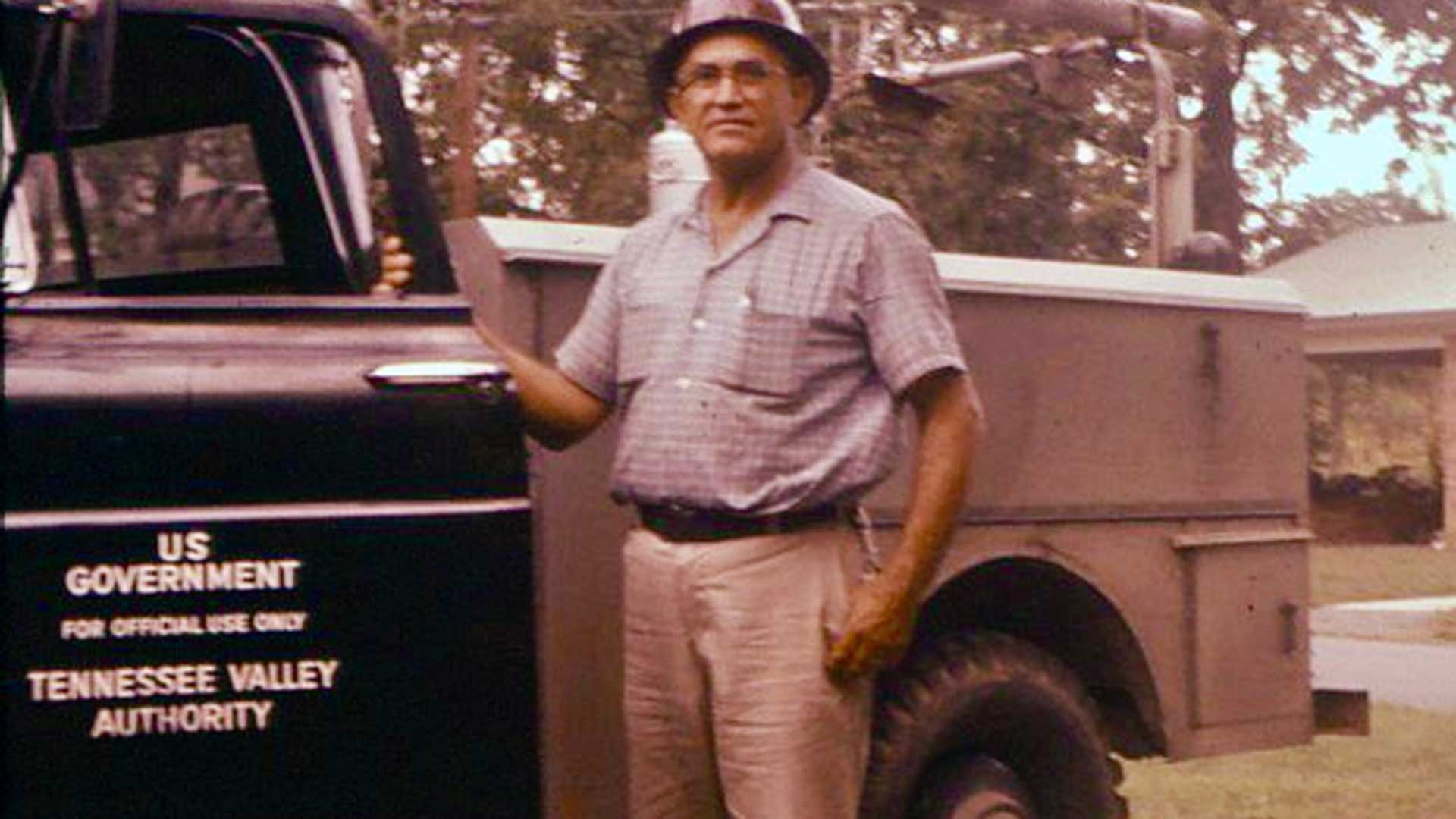 Ranzie Standifer with a TVA work truck in 1961.