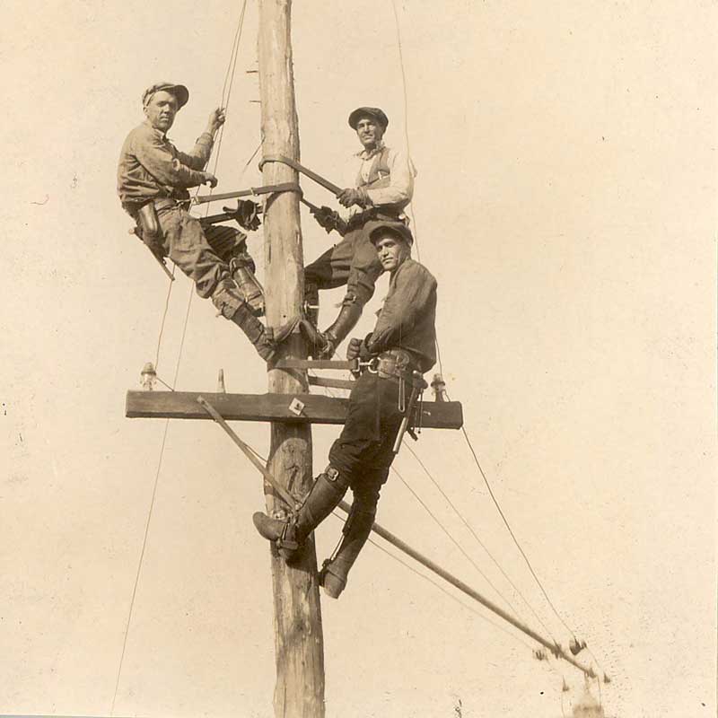 Ranzie Standifer (bottom) as a lineman for TEPCO around 1930.