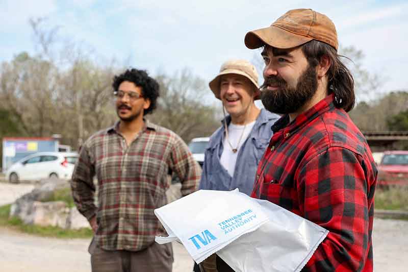Volunteers prepare for trash pickup