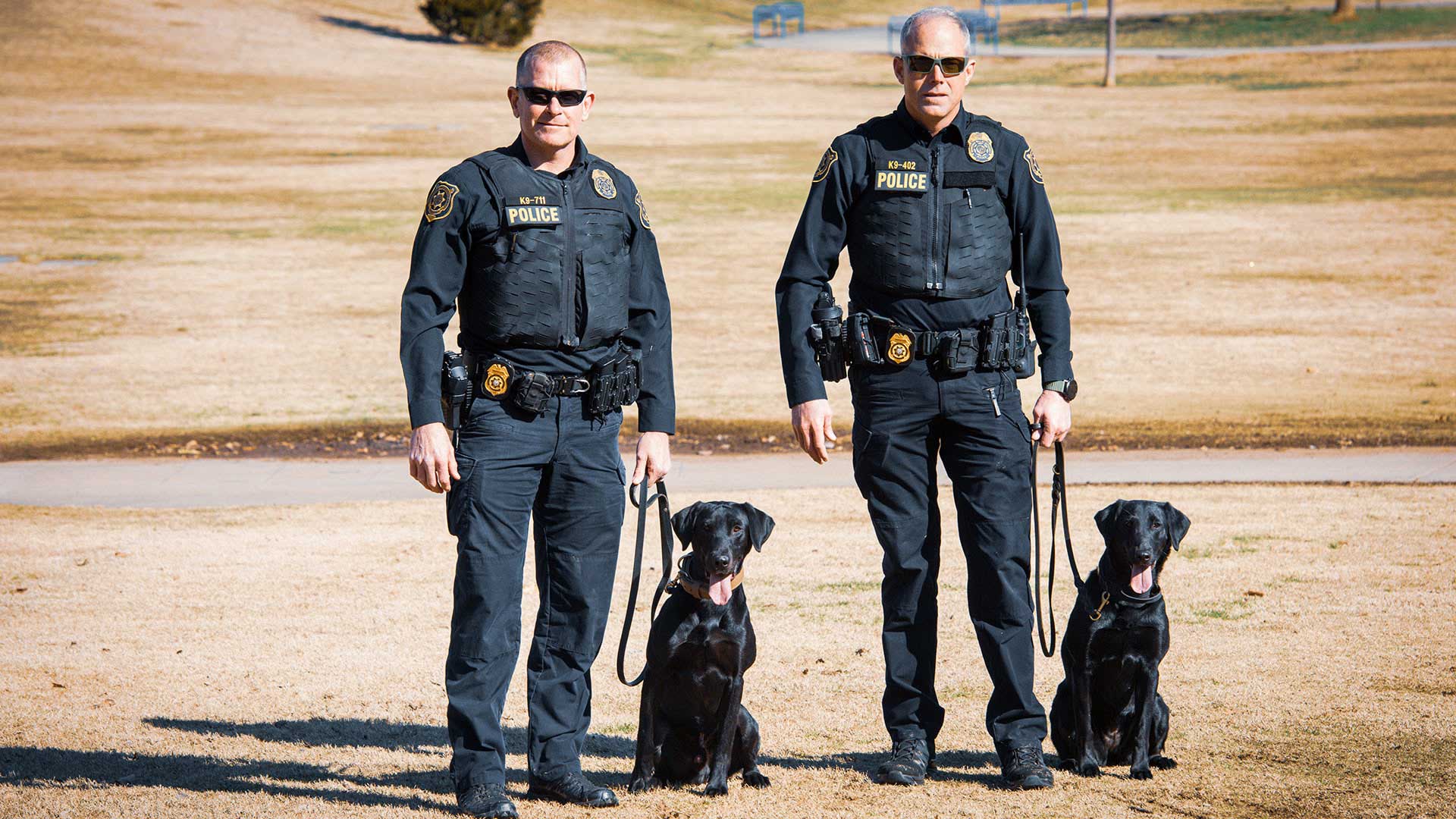 TVA Police with K-9s in park.