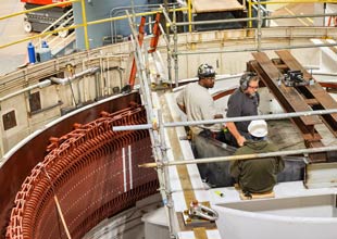 Engineers at Fort Loudon testing turbine alignment