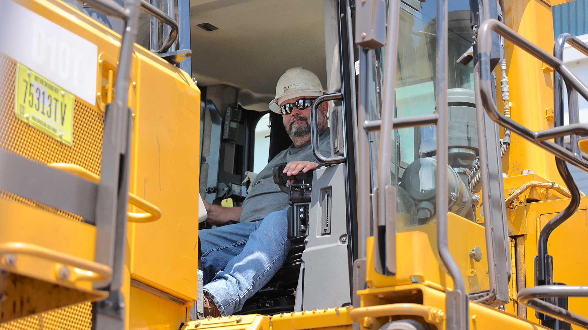 TVA heavy equipment operator Jeff Dalton behind the controls of a bulldozer.