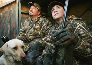 Hunting Dad, Son and Dog