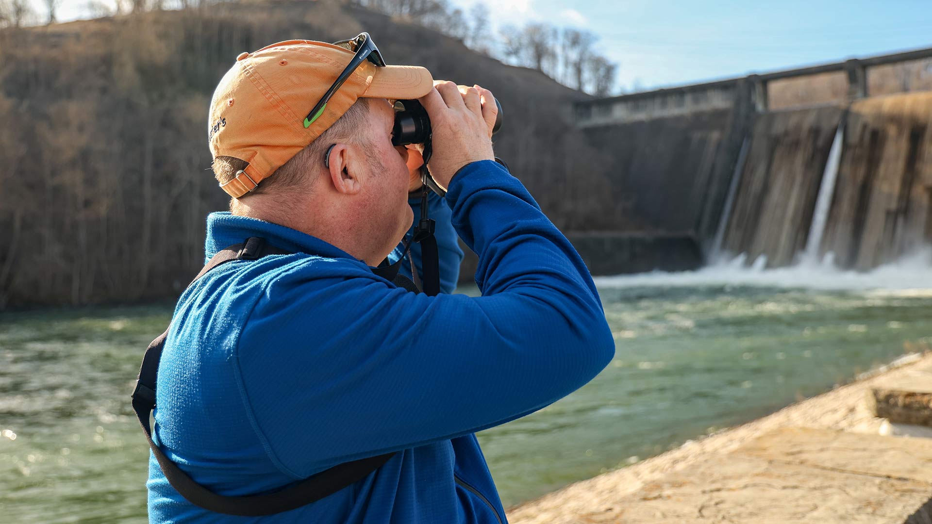 Birdwatching with binoculars near Norris Dam