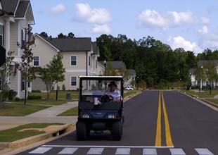 Oxford, Mississippi Resident driving a golf cart