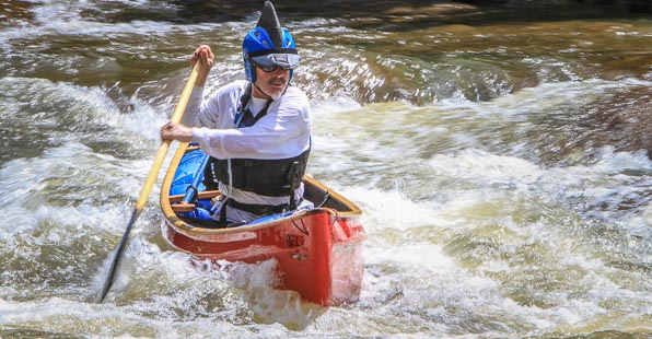 People rafting on the water