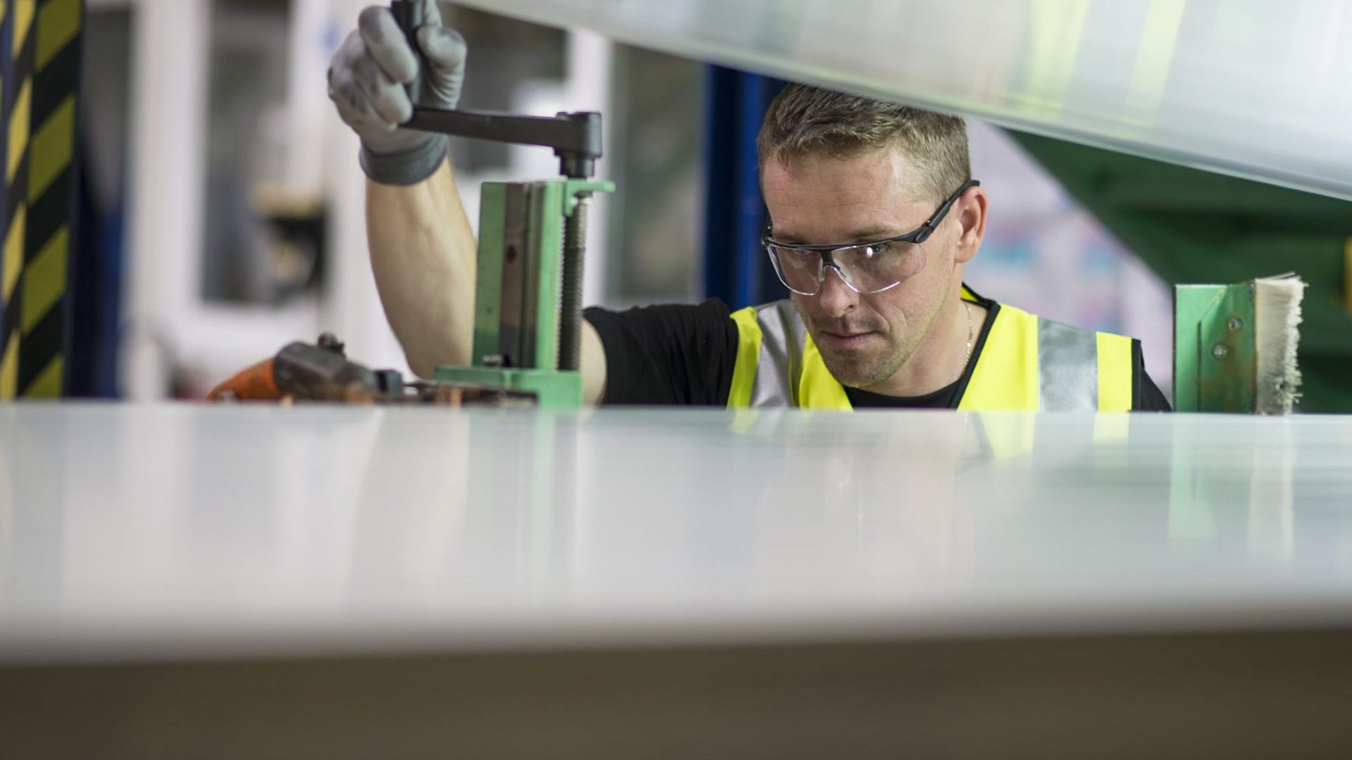 Worker in manufacturing facility
