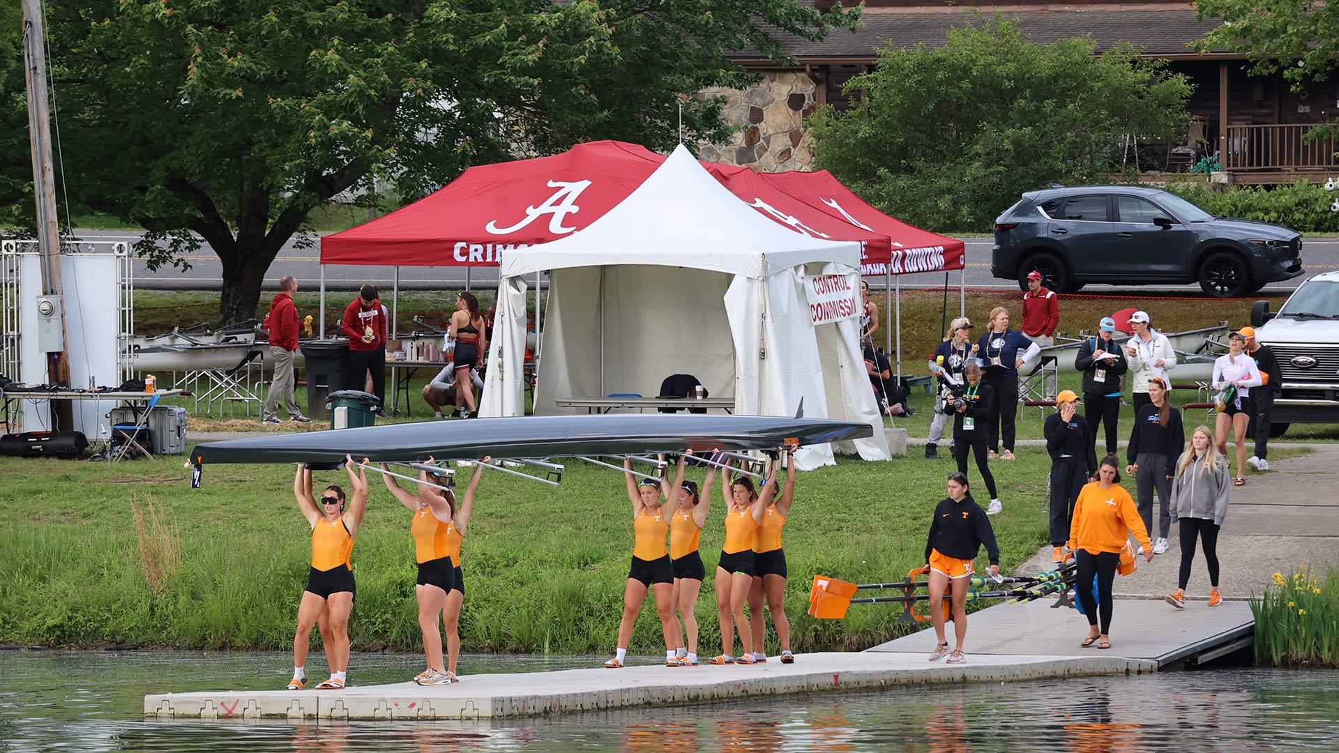 UT rowers carrying boat at SEC event