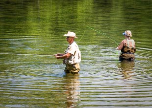 man fishing in river