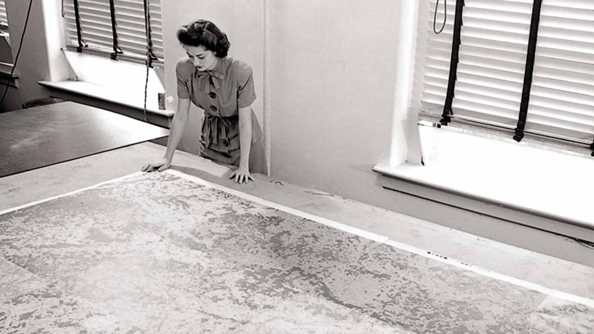 Woman looks at topographical map