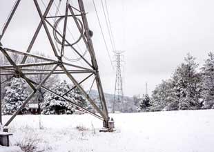 Picture of a transmission tower on a cold winter day