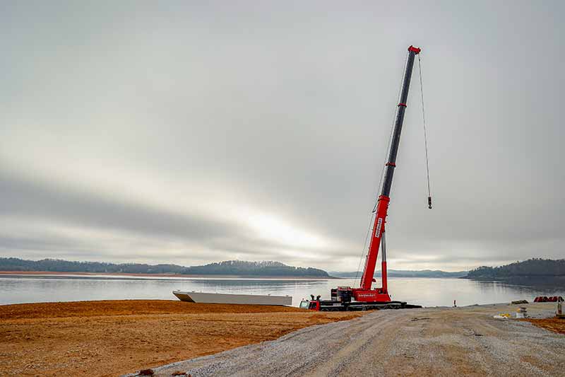 A crane by the waterside