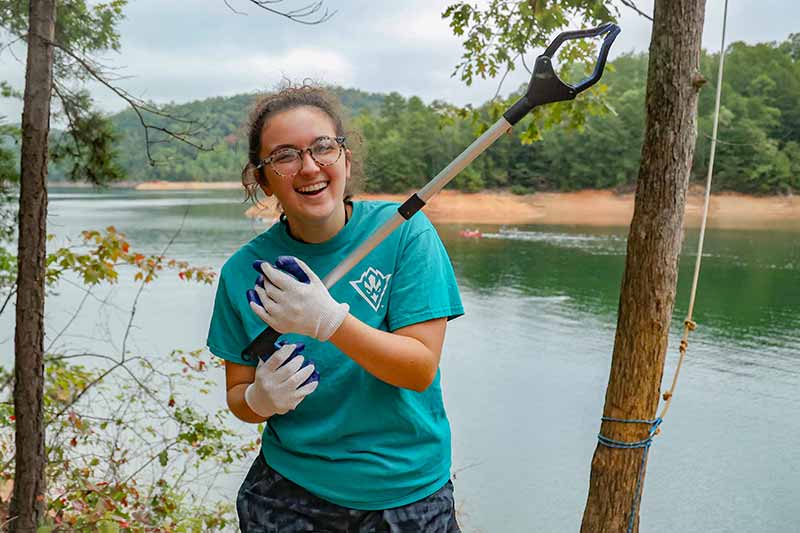 Volunteer at litter clean up event