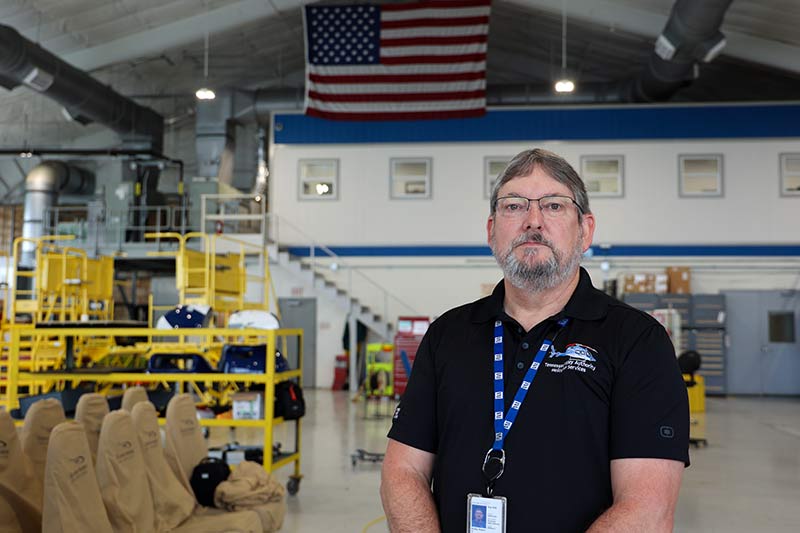 TVA Aviation employee in hangar