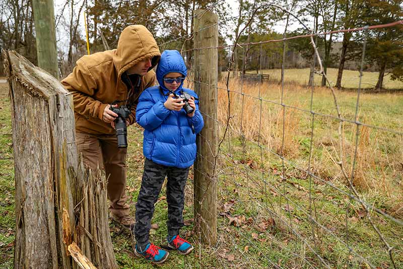 Matt and Connor Mundall photograph sandhill cranes