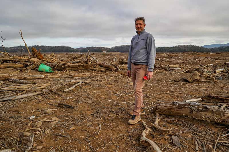 Man in middle of debris
