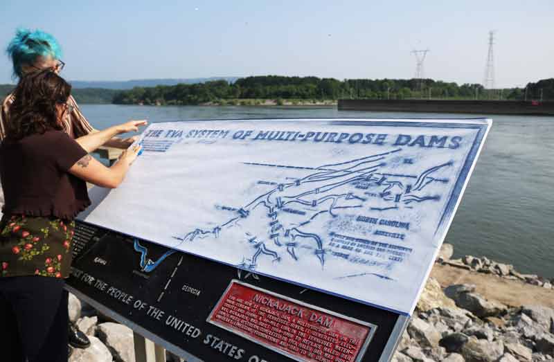 People Viewing Historic Map