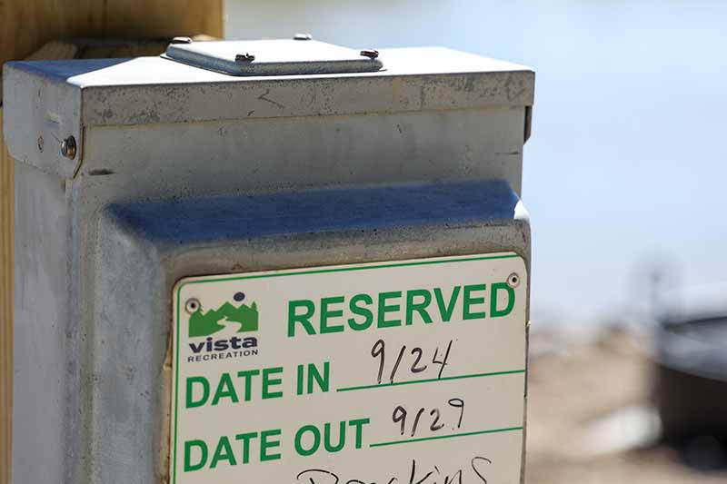 Campground reservation sign dated in September.